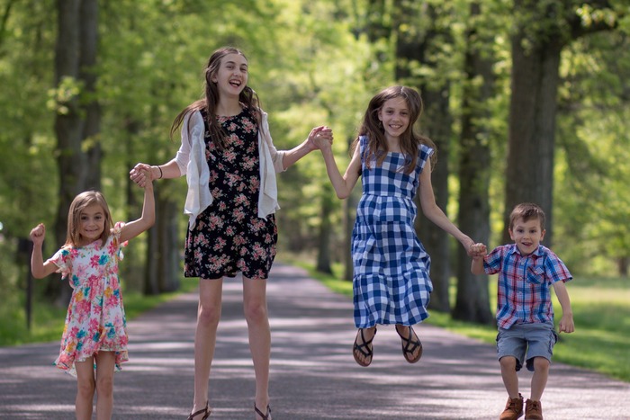 Sacred Kinship - Mid-Air Childhood Joy